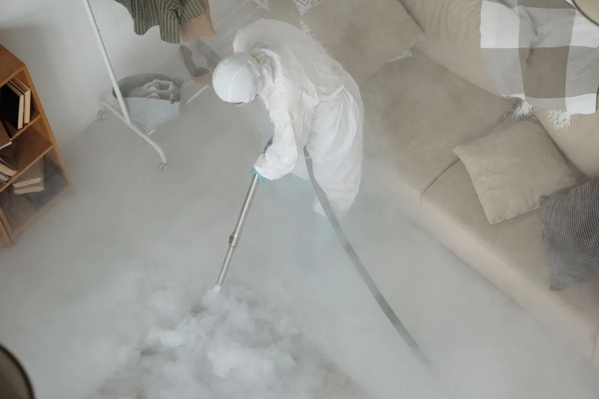 Biohazard cleanup technician in protective equipment, Penhook, VA
